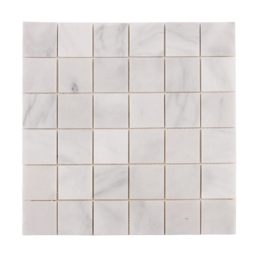Close-up of semi-polished Carrara white marble mosaic veining
