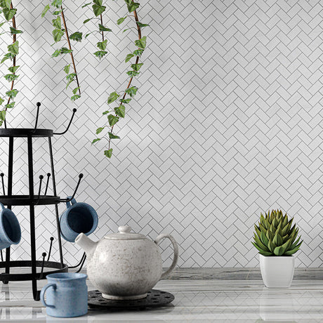 Marble hexagon mosaic tiles on a shower floor