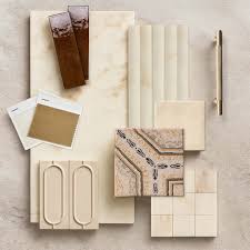 Luxury bathroom featuring Calacatta Amber marble wall slabs and brushed gold brassware.