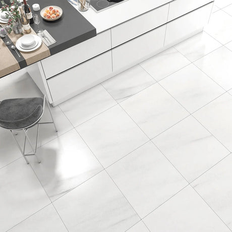 Modern kitchen with white tiled floor and black countertop