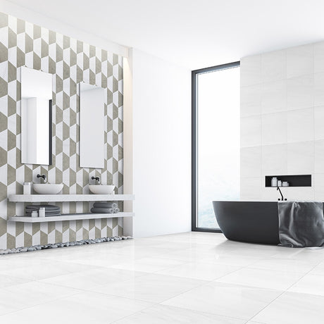 Modern bathroom with geometric wall tiles, black freestanding bathtub, and white vanity.