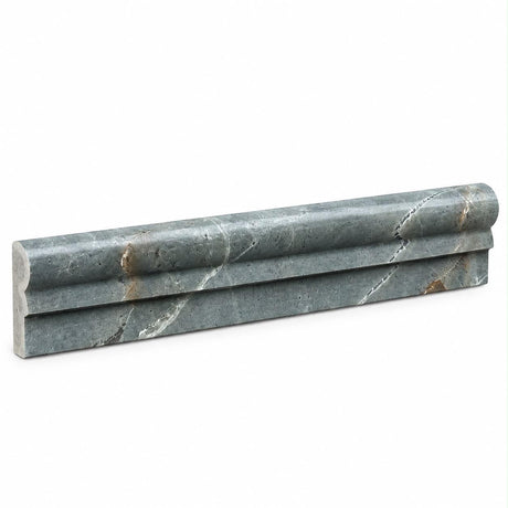Fitz Green Ogge honed marble moulding installed as a dado rail trim on tiled bathroom wall
