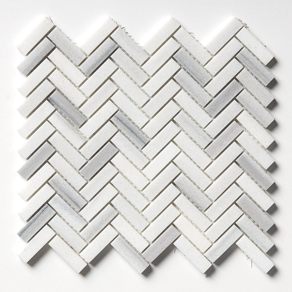 Carrara Neptune Honed Herringbone Marble Mosaic Tile 300×300 mm sheet white-grey veining matte finish.
