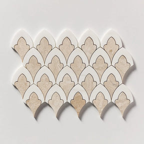A sheet of scalloped mosaic tiles with alternating beige stone and white pieces outlined in dark brown, arranged in a fan pattern on a light gray background.
