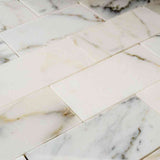 Marble Tiles - Calacatta Gold Subway Marble Mosaic Tiles 100x300x10mm - intmarble