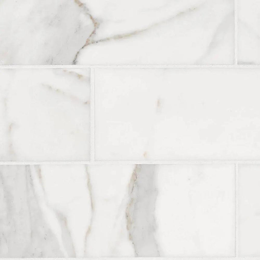 Marble Tiles - Calacatta Gold Honed Italian Subway Marble Tile 75x305x10mm - intmarble